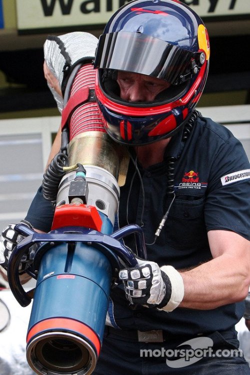 f1-brazilian-gp-2008-a-red-bull-racing-crew-member-with-the-fuel-nozzle-during-a-pit-stop.jpg